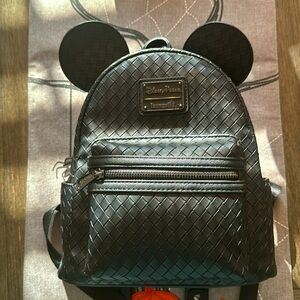 Loungfly all black woven Loungefly backpack.